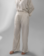 Model wearing The Line white co-ord set - ELYRA
