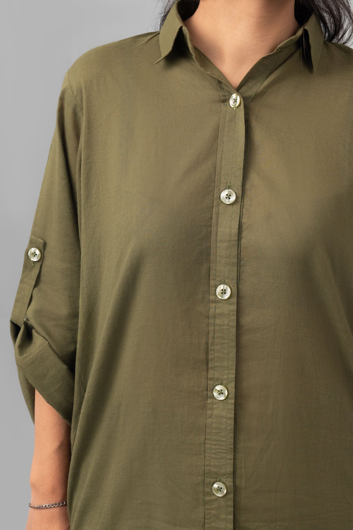 Model wearing olive green lawn co-ord shirt - ELYRA